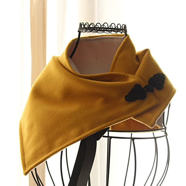 golden yellow and ivory neck wrap with black frog fastener