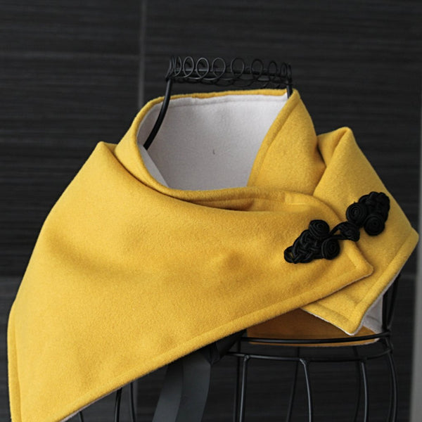 golden yellow and ivory neck wrap with black frog fastener