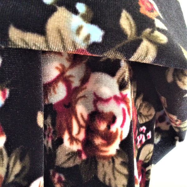 close up detail of floral velvet scarf