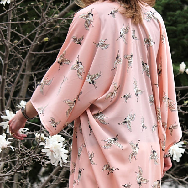 Light pink kimono cardigan with flying cranes back view