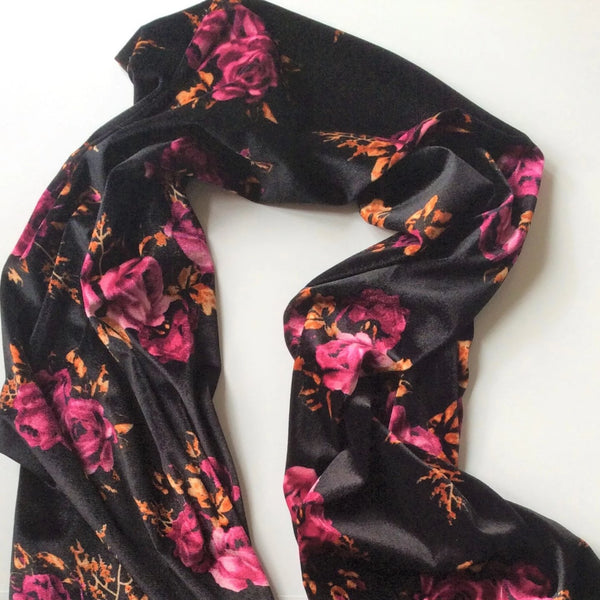 handmade velvet scarf in magenta and black floral flatlay